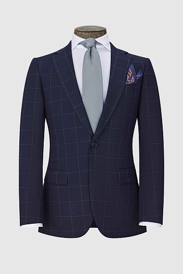 Темно-синий костюм в серую клетку