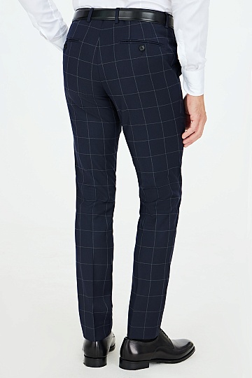 Темно-синие брюки в серую клетку