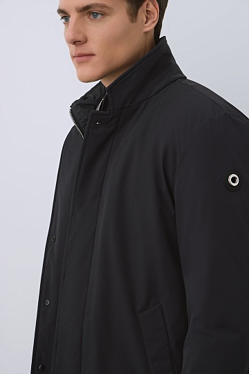 Пуховое пальто темно-синего цвета