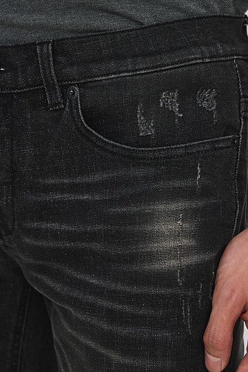 Черные джинсы с потертостями