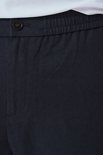 Темно-синие брюки